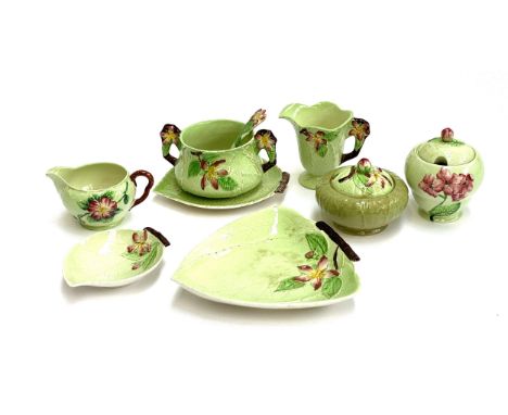 A quantity of Carlton ware 'Apple Blossom' design to include sugar bowls, milk jug, cream jug, etc