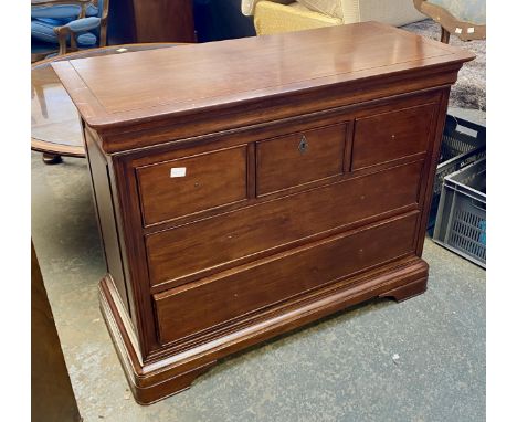 A John Lewis reproduction chest of drawers, having a cushion drawer, over three short and two long drawers, bracket feet, 115