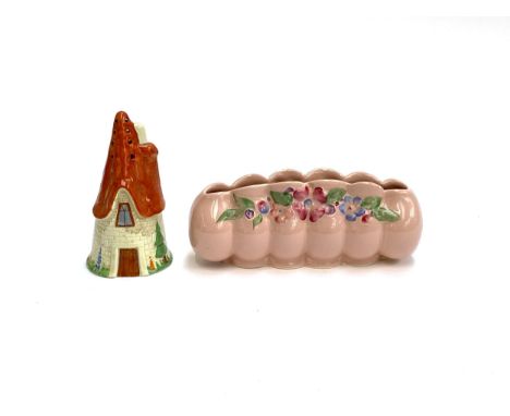 A Clarice Cliff posy trough, model no 178, 19cmW; together with a Carlton Ware cottage shaped sugar sifter, 13.5cmH (2)