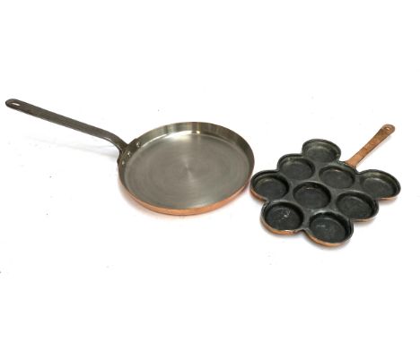 A wrought iron, copper, and steel lined skillet, 25cmD, and a copper Aeble skiver pan, handle stamped 288Y