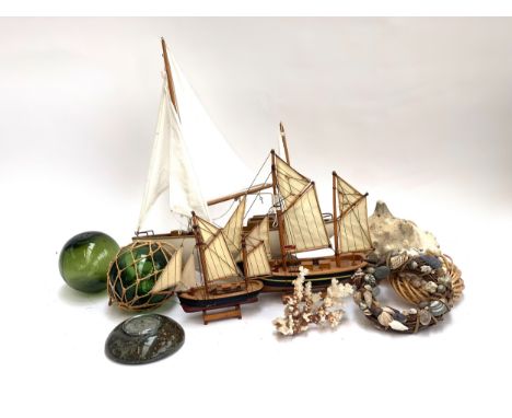 Maritime interest: two model Brixham trawlers, the larger 33cmL; together with a white painted pond yacht 44cmW; a Weathermas