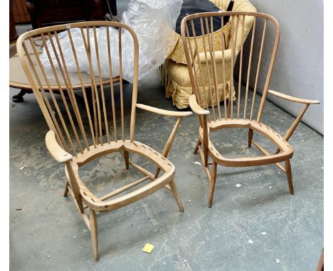 A pair of Ercol 478 model stickback armchairs, 73cmW, in need of upholstery