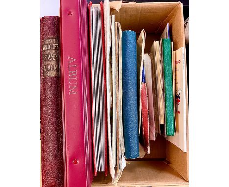 PHILATELY: A group of well-filled albums, stock books and mint sets.