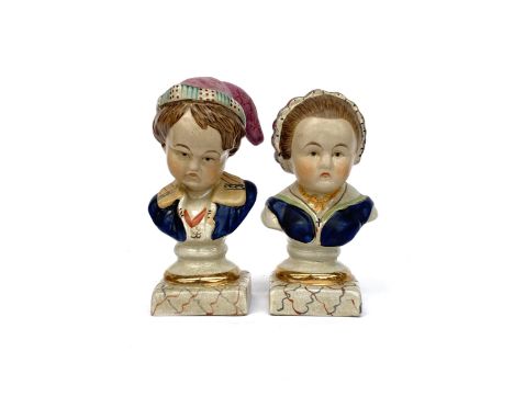 A pair of 20th century Staffordshire busts of the Bourbon children, 21.5cmH