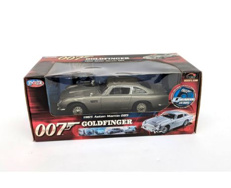 A 1965 Aston Martin DB5 from the movie Goldfinger, with a 007 QCARD Interactive CD-ROM, boxed