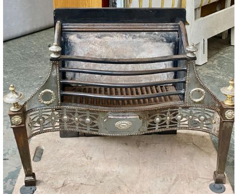 A large polished steel fire grate in George III Adam style, 88cmW