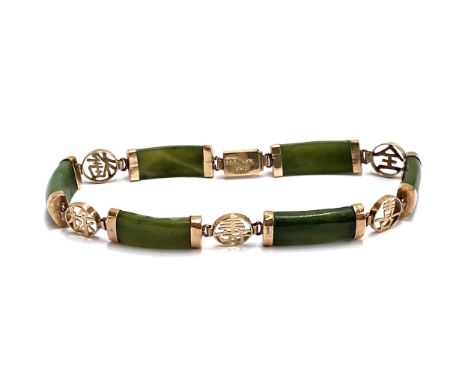 A 14ct gold and jade bracelet, stamped Taiwan 14k, 18.5cmL unclasped, 9.4g gross weight