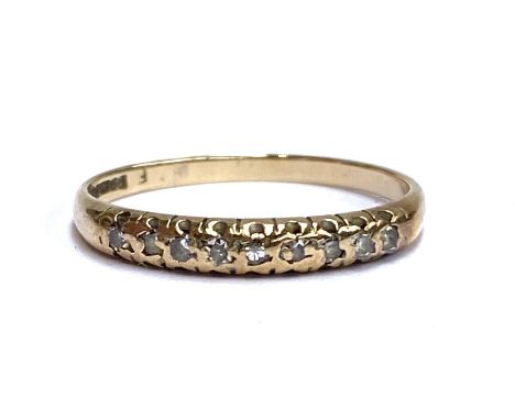 A 9ct gold and diamond ring, size N, 1.2g