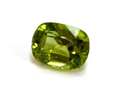 A loose cushion cut peridot, 2.65cts, with GFCO lab certificate, 9.08x6.81x5.36mm