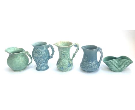 A quantity of Sylvac ware jugs to include Price Bros, Arthur Wood, etc, the tallest 20cm; together with a large Art Deco Besw