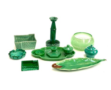 A quantity of green glass and ceramics to include; an art deco malachite glass dressing table tray, candlestick, ashtray, Lan
