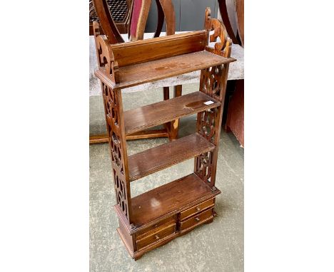 A 20th century mahogany wall shelf in 20th century case, four shelves with pierced sides and four drawers below, 54x20x114cmH