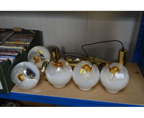 A quantity of light fittings and glass light shades