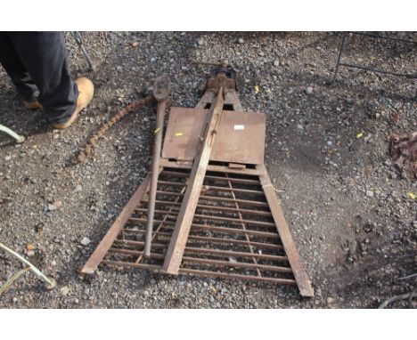 A pipe vice and pipe wrench