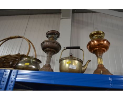 A brass teapot; two oil lamps one converted etc