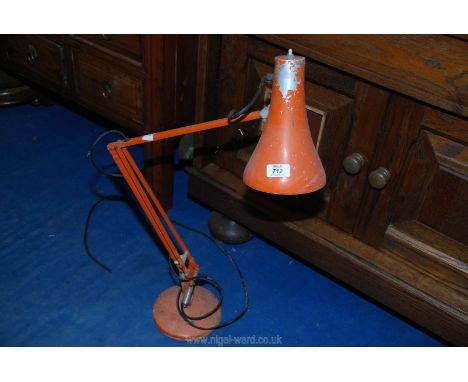 An angle poise lamp