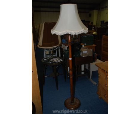 Turned wooden standard lamp