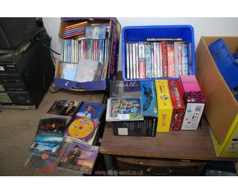 DVD's including Sex and The City, CD's, alarm clock etc.