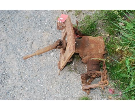 A tractor P.T.O. driven Jungle Buster/brush clearing implement.