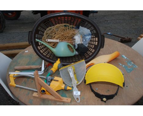 Basket of hand garden tools, visor etc.