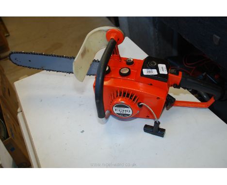 A Kioritz Echo 302 petrol chainsaw. Not started but has good compression.