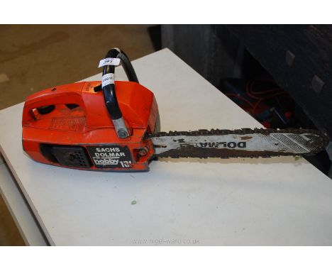 A Sachs Dolmar hobby 101 petrol chainsaw. Not started but has good compression.