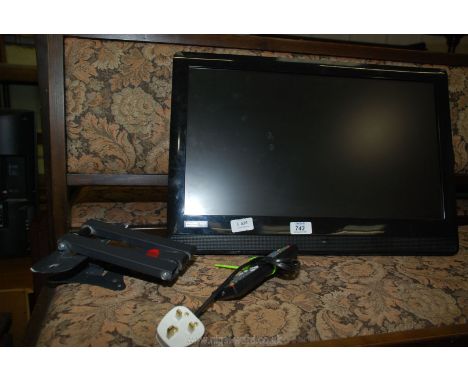 22'' DVD TV with wall bracket complete with remote.