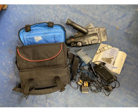 A Samsung My Cam K60 8mm Video Camera with charger, instructions Gadget Case and accessories.