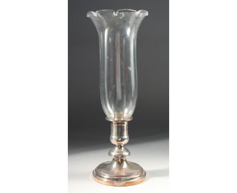A CHRISTOFLE, FRANCE, STORM LAMP with glass top and circular plated base. 16ins high.