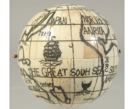 A LARGE ETCHED BONE GLOBE COMPASS. 2.75ins diameter.