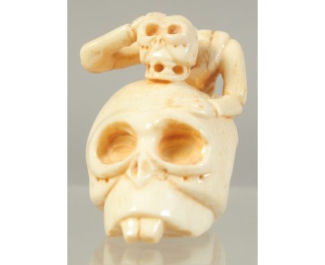 A CHINESE CARVED BONE SKULL AND SKELETON.