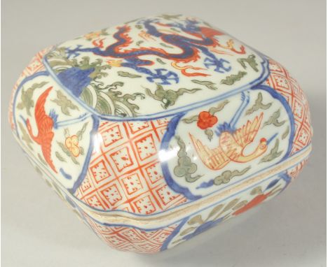 A CHINESE WUCAI PORCELAIN DRAGON BOX. 16.5ins wide.