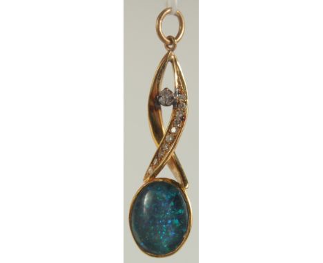 A 14CT GOLD CABOCHON OVAL OPAL AND DIAMOND SET PENDANT.