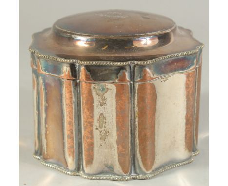 A SILVER PLATED TEA CADDY AND COVER, with engraved crest.