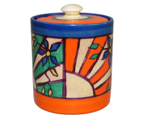 A Wilkinson and Co. Clarice Cliff Fantasque perserve pot and cover, of cylindrical form with bun knop, painted in a sunburst 