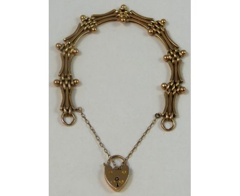 A Victorian 9ct rose gold fancy gate link bracelet, padlock clasp, weight 11 grams.