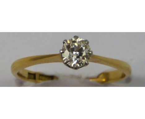 An 18ct gold single stone diamond ring, claw set with a brilliant cut stone weighing approximately 0.50 cts, size R.