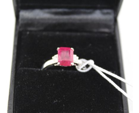 Emerald cut Ruby of 1.4 carats ring with diamond baguette shoulders white gold hallmarked 18ct