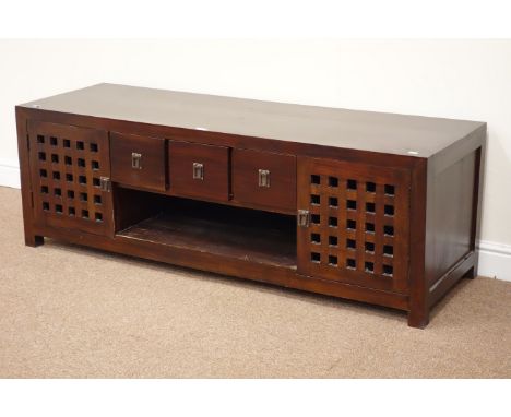 Hardwood Chinese style television stand fitted with cupboards either side, three drawers and shelf to the centre, W157cm, D50