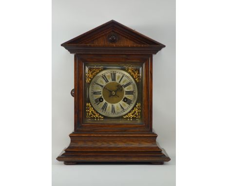 20th century oak mantle clock, Junghans movement, in oak architectural case, enclosed by bevel glass glazed door, W26cm CLOCK