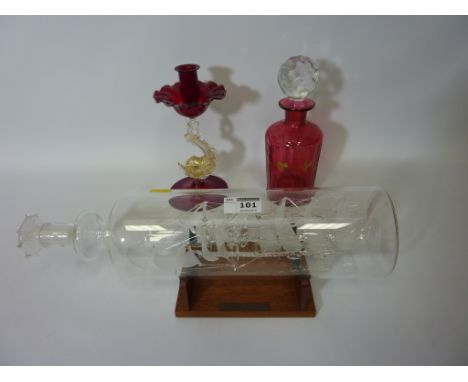 Small Victorian cranberry glass decanter with gilded decoration, 'SS Great Britain' glass ship in bottle and a Murano ruby gl