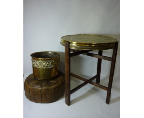 Anglo-Indian 'Mosq' Benares table, Eastern pouffe, and an embossed brass jardiniere (3) 