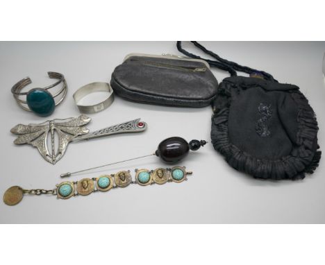 A Victorian purse with paste set clasp, on Art Nouveau style butterfly brooch, hat pin brooch, etc., and a white metal bangle