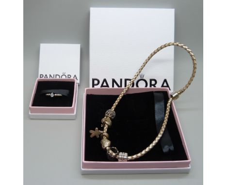 A Pandora necklace with six charms, and a Pandora ring, K
