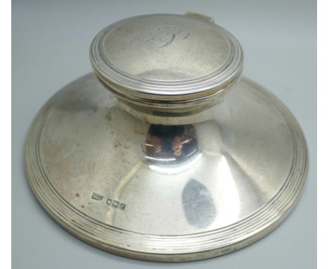 A silver Capstan inkwell, Sheffield 1920, diameter of base 14.5cm