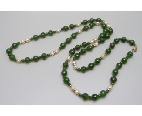 A jade and pearl necklace with 9ct gold clasp and spacers, 55g, 84cm