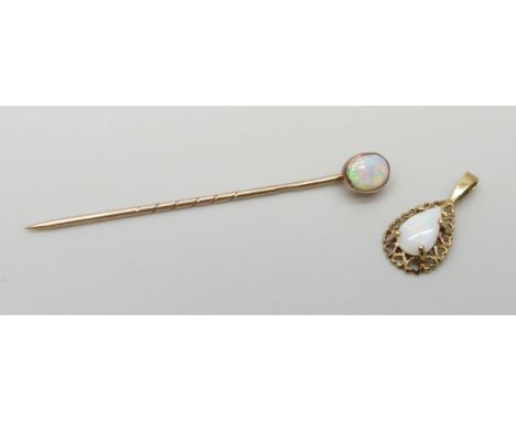 A 9ct gold stick pin set with an opal and a 9ct gold fretwork pendant with heart design border set with an opal, 1.4g