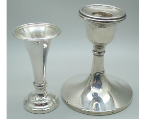 A silver candlestick, Birmingham 1927 and a silver vase, Sheffield 1980, weighted, vase 8.5cm