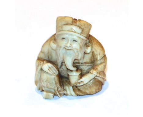 Japanese ivory netsuke, seated Daikoku, 4cm high .  Weight 28g