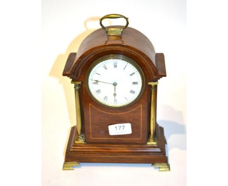 An Edwardian mahogany inlaid mantel timepiece, 27cm high .  Significant crack to upper moulding back bracket is misshapen, al